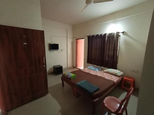 Professionals Pride PG : photo 3 de la chambre chambre double avec salle de bains privative