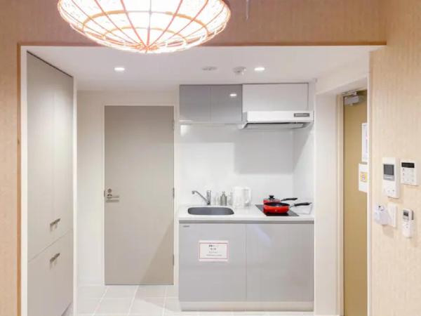 japan house nishishinjuku : photo 9 de la chambre chambre lits jumeaux avec salle de bains privative