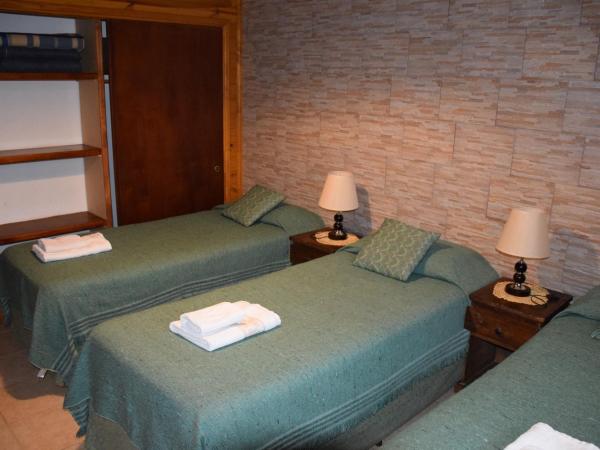 Hosteria Rukahué : photo 6 de la chambre chambre triple avec salle de bains privative