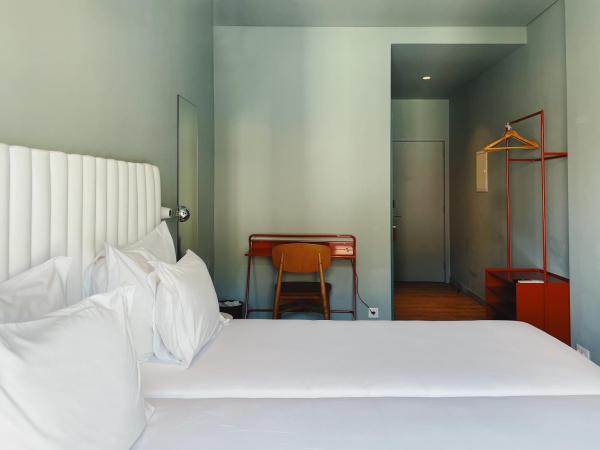 Esqina Cosmopolitan Lodge : photo 2 de la chambre chambre double ou lits jumeaux supérieure avec vue sur ville