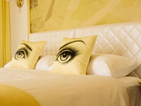 Angad Arts Hotel : photo 2 de la chambre chambre queen simple