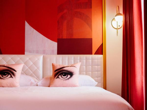 Angad Arts Hotel : photo 1 de la chambre chambre lit queen-size 