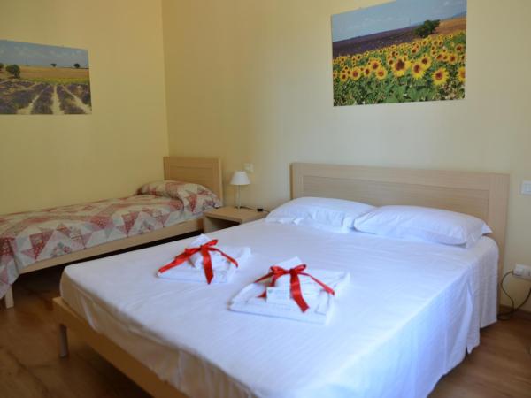 B&B Il Mondo Di Ross : photo 10 de la chambre grande chambre double avec salle de bains privative