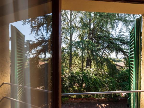 Villa Scacciapensieri Boutique Hotel : photo 7 de la chambre chambre triple supérieure - annexe