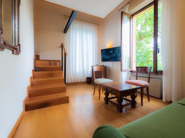 Villa Scacciapensieri Boutique Hotel : photo 10 de la chambre chambre triple supérieure - annexe