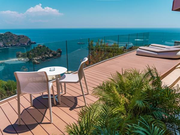 Isola Bella Infinity Suites : photo 9 de la chambre appartement supérieur avec piscine privée