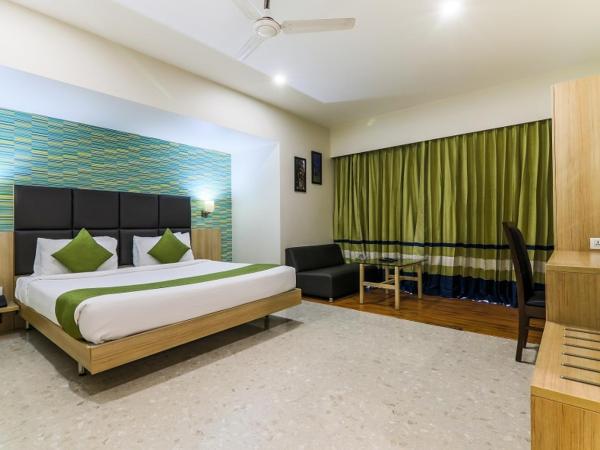 Magnus Star Residency : photo 5 de la chambre chambre lit king-size deluxe