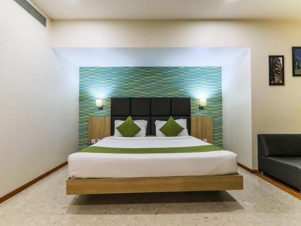 Magnus Star Residency : photo 4 de la chambre chambre lit king-size deluxe