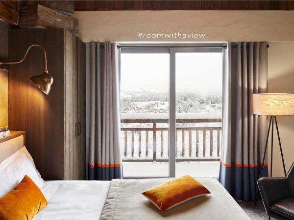 Hôtel L'Arboisie : photo 1 de la chambre la suite megève avec balcon