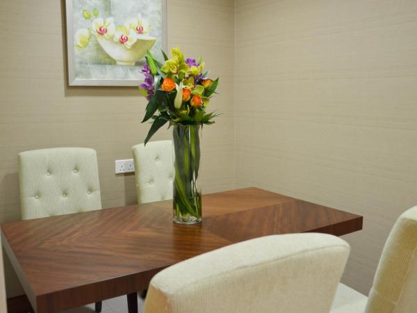 Carlton Downtown Hotel : photo 3 de la chambre suite deluxe 2 chambres