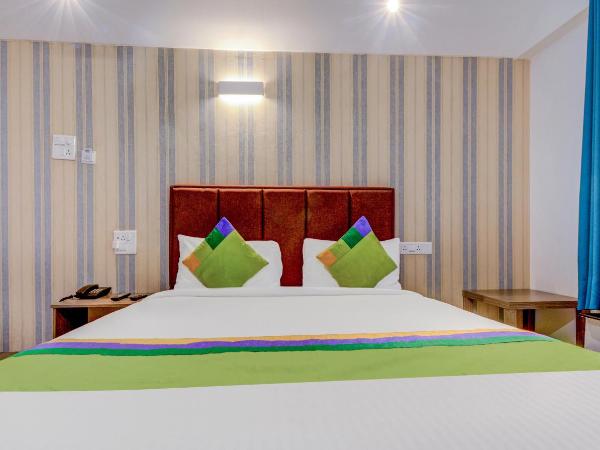 Treebo Iris Suites : photo 4 de la chambre chambre double deluxe