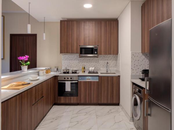 Avani Plus Palm View Dubai Hotel & Suites : photo 4 de la chambre appartement en duplex supérieur