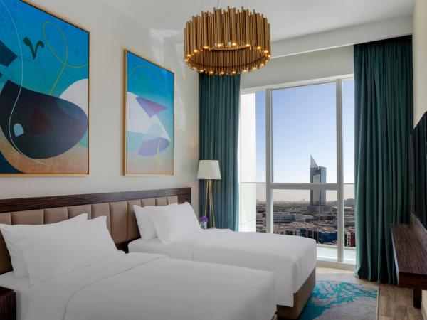 Avani Plus Palm View Dubai Hotel & Suites : photo 1 de la chambre appartement supérieur 1 chambre