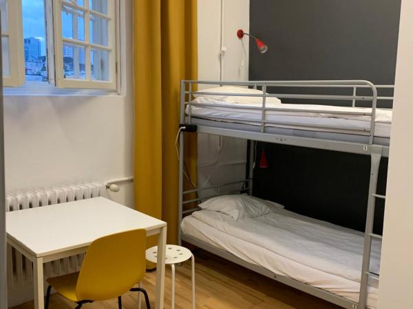 New World St Hostel and Private Room : photo 1 de la chambre chambre quadruple Économique avec salle de bains commune