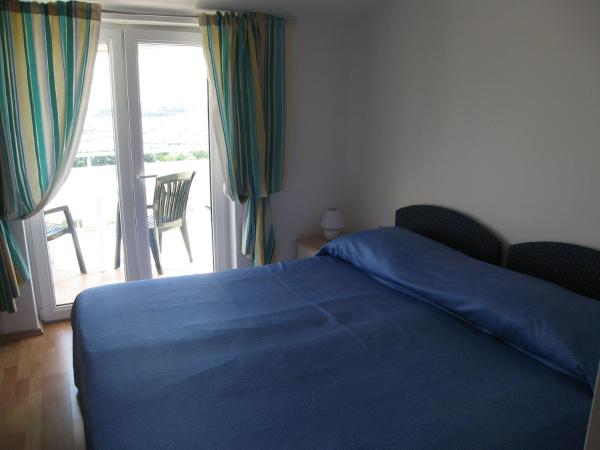 Guest house Zimmer F1 : photo 2 de la chambre chambre double - vue sur mer