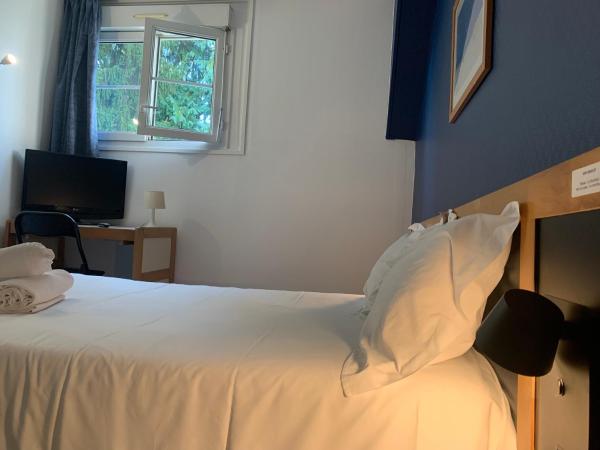 Hôtel Montilleul - Villa Primrose : photo 2 de la chambre chambre lits jumeaux avec toilettes communes