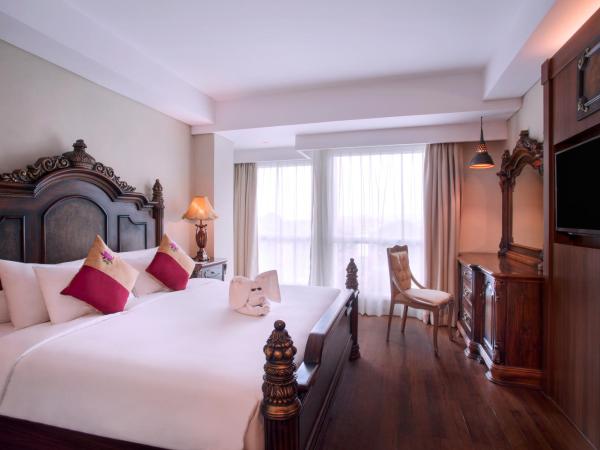 Grand Mercure Yogyakarta Adi Sucipto : photo 5 de la chambre suite deluxe avec lit king-size