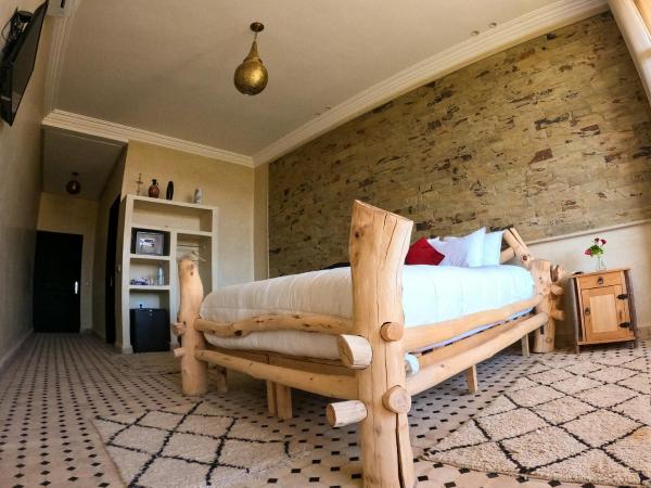 kasbah yu palace : photo 5 de la chambre chambre lits jumeaux - vue sur piscine