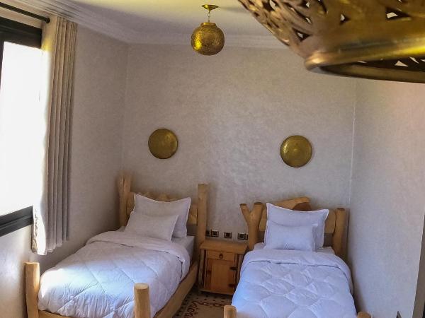 kasbah yu palace : photo 2 de la chambre chambre triple - vue sur la piscine