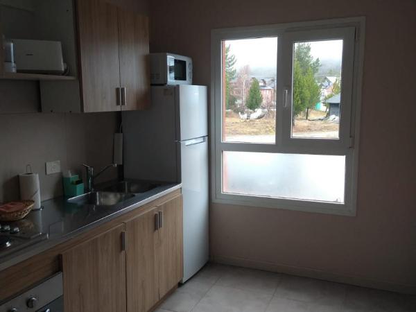 Village Condo : photo 2 de la chambre appartement 2 chambres (5 adultes)