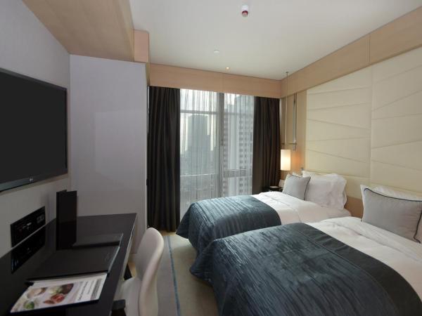 Wyndham Grand Istanbul Levent : photo 6 de la chambre suite familiale 2 chambres avec kitchenette - vue partielle sur mer