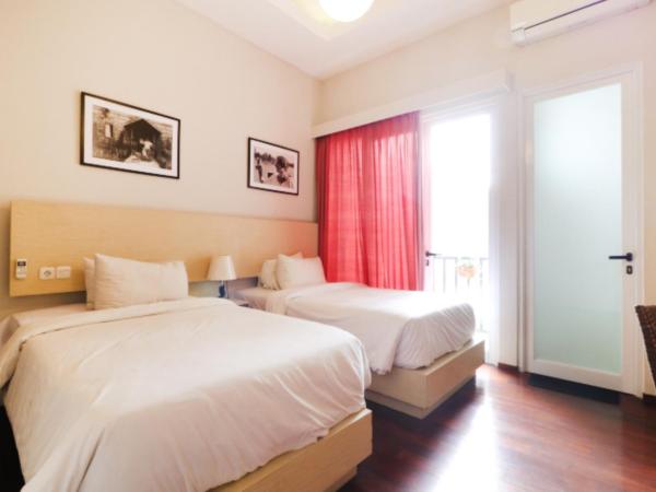 Pejaten Valley Residence : photo 7 de la chambre chambre familiale