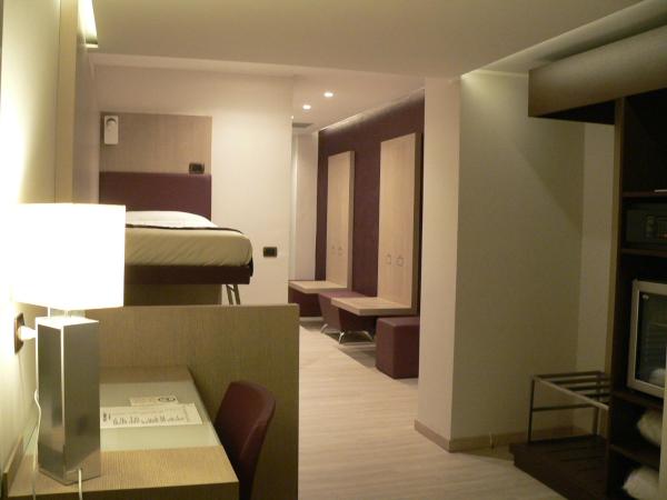 Hotel Soperga : photo 3 de la chambre chambre quadruple avec salle de bains privative
