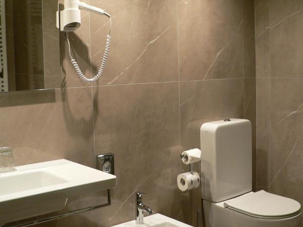 Hotel Soperga : photo 1 de la chambre chambre quadruple avec salle de bains privative
