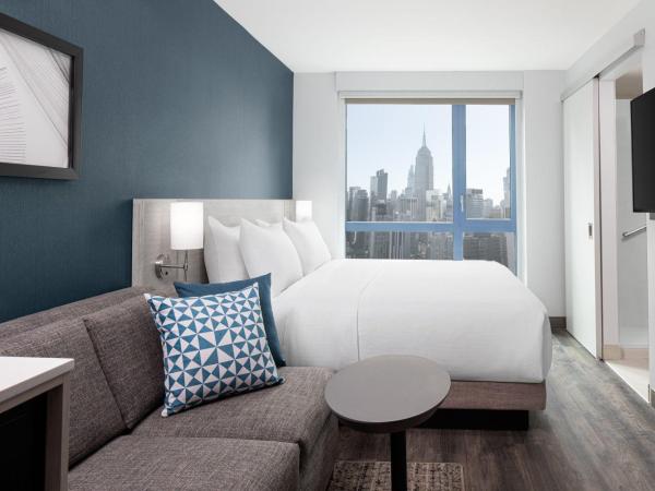 Hyatt Place New York Chelsea : photo 5 de la chambre chambre lit king-size avec canapé-lit - vue sur horizon