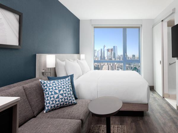 Hyatt Place New York Chelsea : photo 6 de la chambre chambre lit king-size avec canapé-lit - vue sur horizon