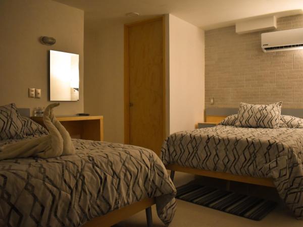 El Suburbio - Morelos Sur : photo 1 de la chambre chambre quadruple confort