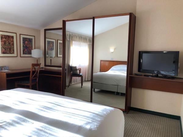 Arli Hotel Business and Wellness : photo 2 de la chambre chambre double ou lits jumeaux