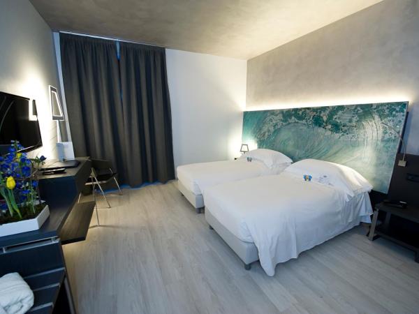 Arli Hotel Business and Wellness : photo 1 de la chambre chambre double ou lits jumeaux supérieure