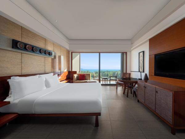 Pullman Oceanview Sanya Bay Resort & Spa : photo 1 de la chambre chambre lit king-size de luxe - vue sur océan