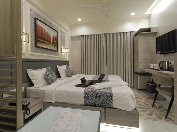 Hotel Elysian Residency : photo 7 de la chambre chambre deluxe double ou lits jumeaux