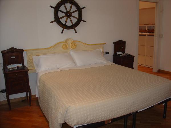 City's House Guest House : photo 5 de la chambre chambre quadruple avec salle de bains commune