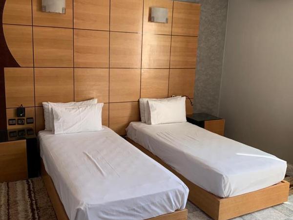 Amor Hotel : photo 2 de la chambre chambre lits jumeaux deluxe