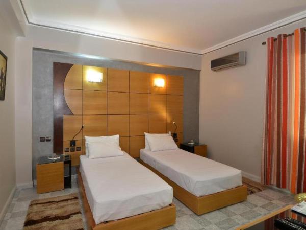 Amor Hotel : photo 3 de la chambre chambre lits jumeaux deluxe