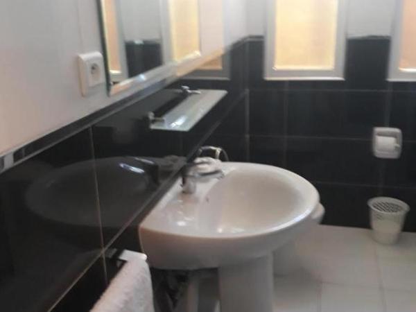 Amor Hotel : photo 1 de la chambre chambre lits jumeaux deluxe