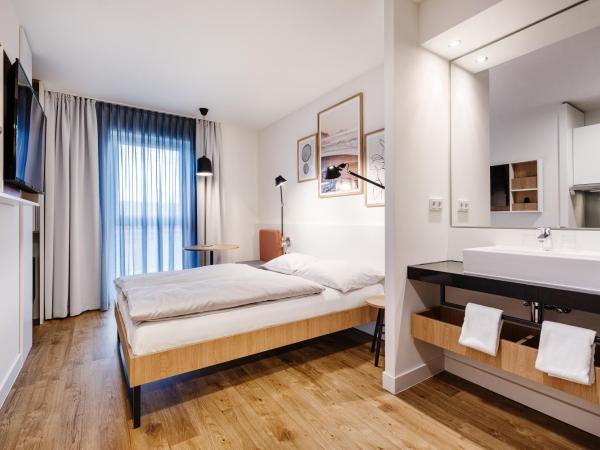 SMARTments business Mannheim Hauptbahnhof : photo 4 de la chambre studio