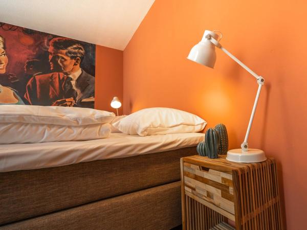 Pink Flamingo Boutique Hostel : photo 3 de la chambre chambre double deluxe avec baignoire