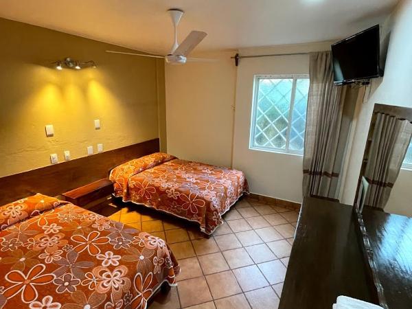 HOTEL BUGAMBILIAS : photo 1 de la chambre chambre standard avec 2 lits queen-size