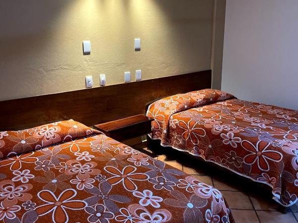 HOTEL BUGAMBILIAS : photo 6 de la chambre chambre standard avec 2 lits queen-size