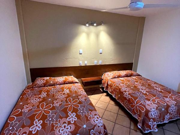 HOTEL BUGAMBILIAS : photo 2 de la chambre chambre standard avec 2 lits queen-size