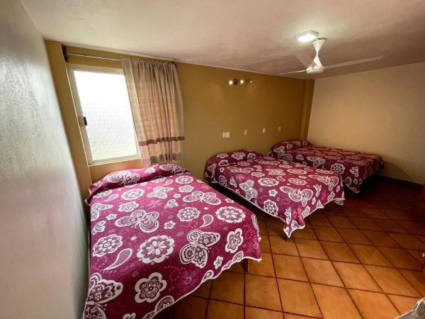 HOTEL BUGAMBILIAS : photo 1 de la chambre chambre triple confort