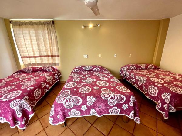 HOTEL BUGAMBILIAS : photo 4 de la chambre chambre triple confort