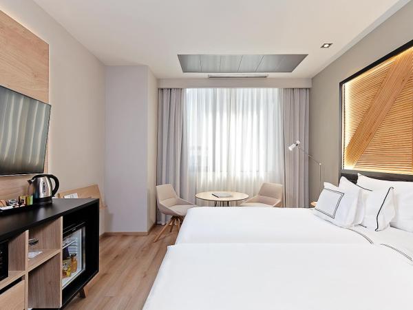 Melia Avenida de America : photo 1 de la chambre chambre lits jumeaux