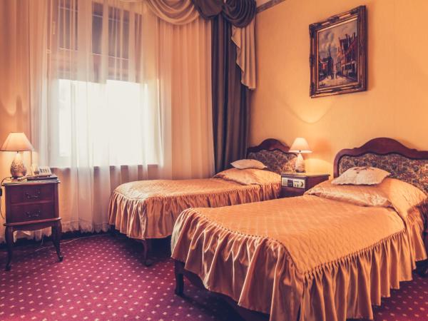 Hotel Europejski : photo 1 de la chambre chambre triple