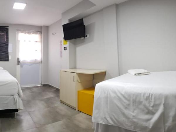 Esquina Batel - Hotel Econômico : photo 2 de la chambre chambre lits jumeaux pour personnes à mobilité réduite