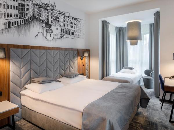 Garden Square Hotel : photo 3 de la chambre chambre quadruple